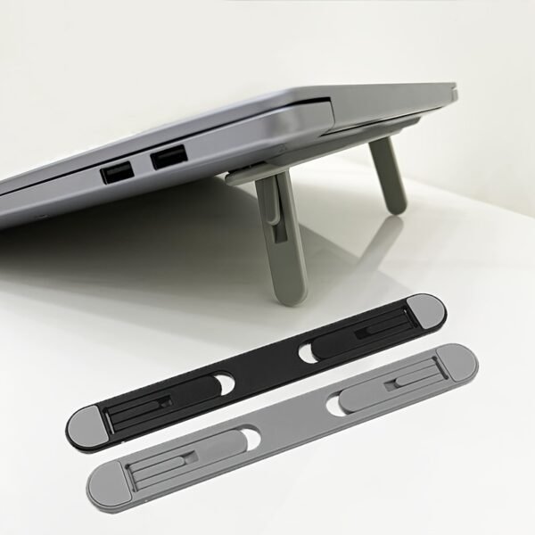 2cb7994a-04bf-40e0-91e1-961b78772ab9.jpg Adjustable Foldable Laptop Stand Portable Ergonomic Notebook Holder