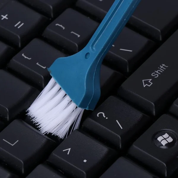 a4b129b939fca0869386411f93d40fdb.webp Mini Desktop Cleaning Brush – Small Broom Sweep Tool for Desk, Computer Keyboard & Car Interior